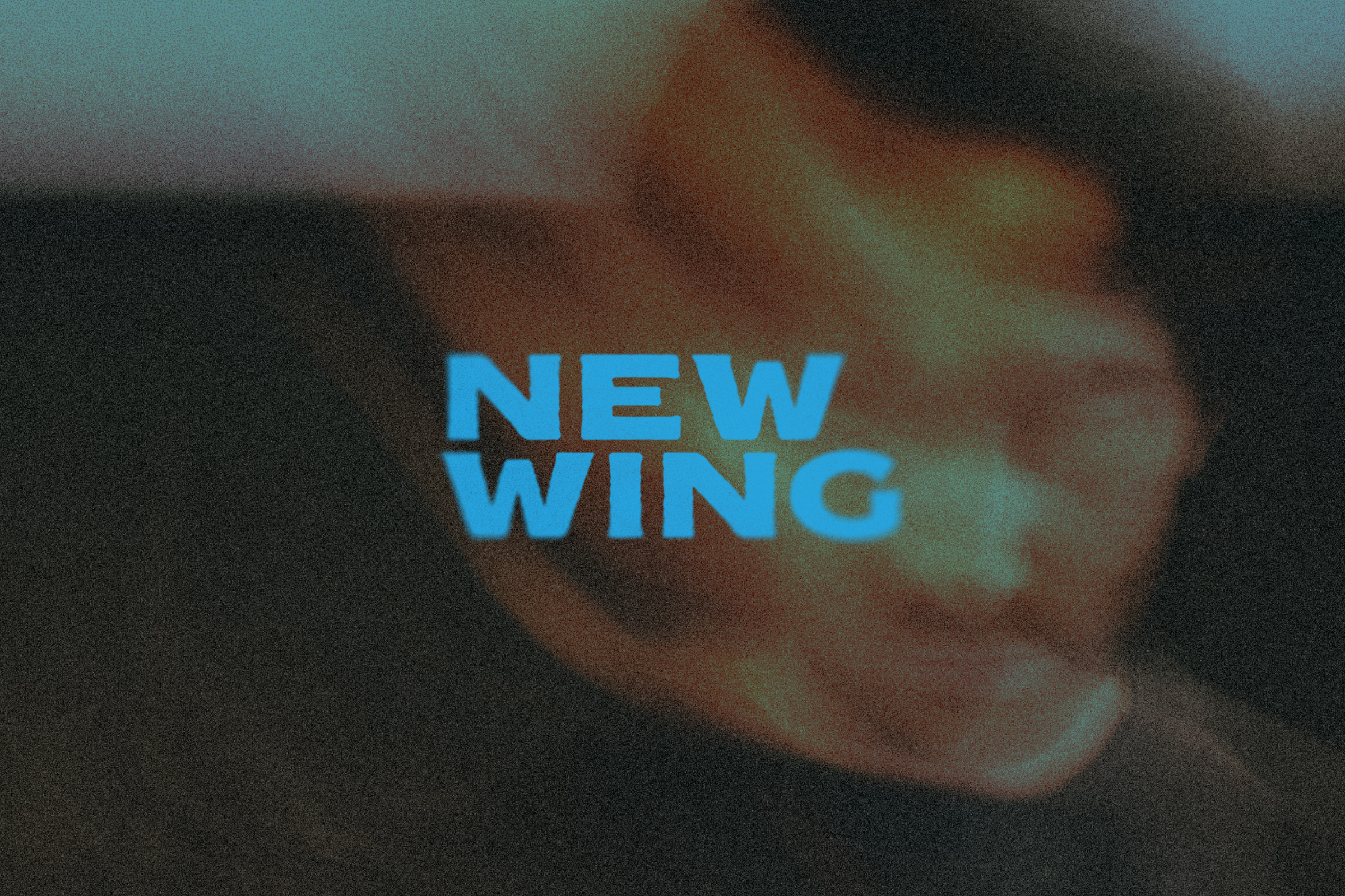 New Wing in violet and blue club light